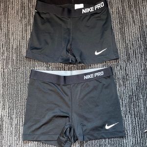 Two Pairs of Nike Pros